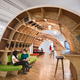 Illustration for article titled This gorgeous office has an endless desk made by robots